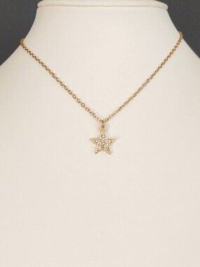 Delicate small gold and faux diamond star necklace